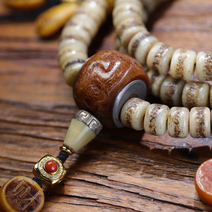 Yak leg bone mala side view