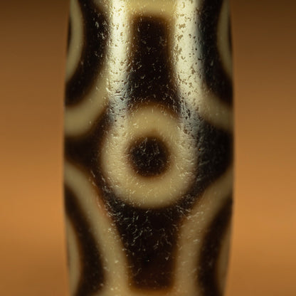 Six eye dzi bead side view