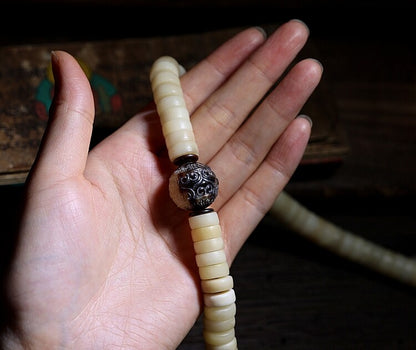 Tibetan yak bone mala bead close up