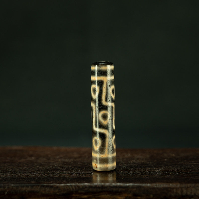 Collector grade pure dzi bead with sky earth motif main view