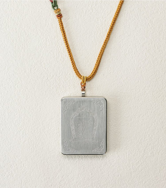 Yellow Jambhala thangka pendant necklace side view