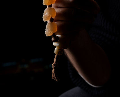 Goat horn and bead accessory texture detail