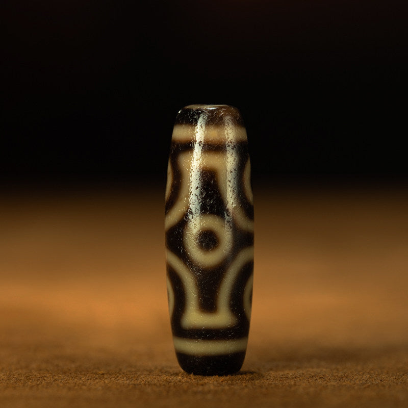 Collector grade Tibetan dzi bead with six eye motif main view