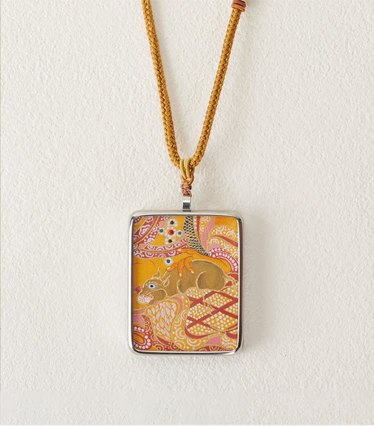 Yellow Jambhala hand painted thangka pendant necklace main view