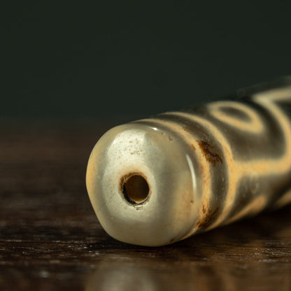 Pure dzi bead sky earth motif close up