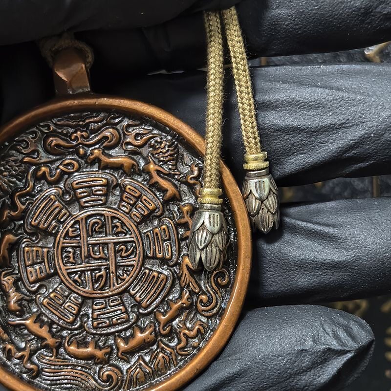 Purple copper Bagua pendant close up