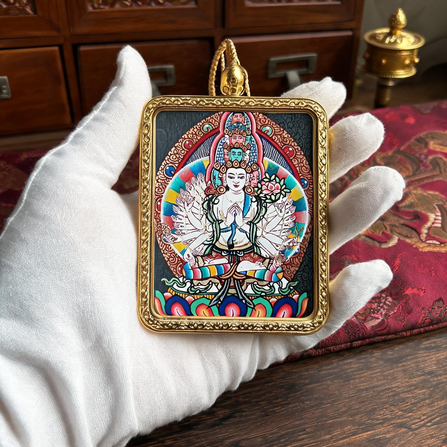 Thousand-Armed Avalokiteshvara hand-painted Thangka pendant white-glove collector inspection