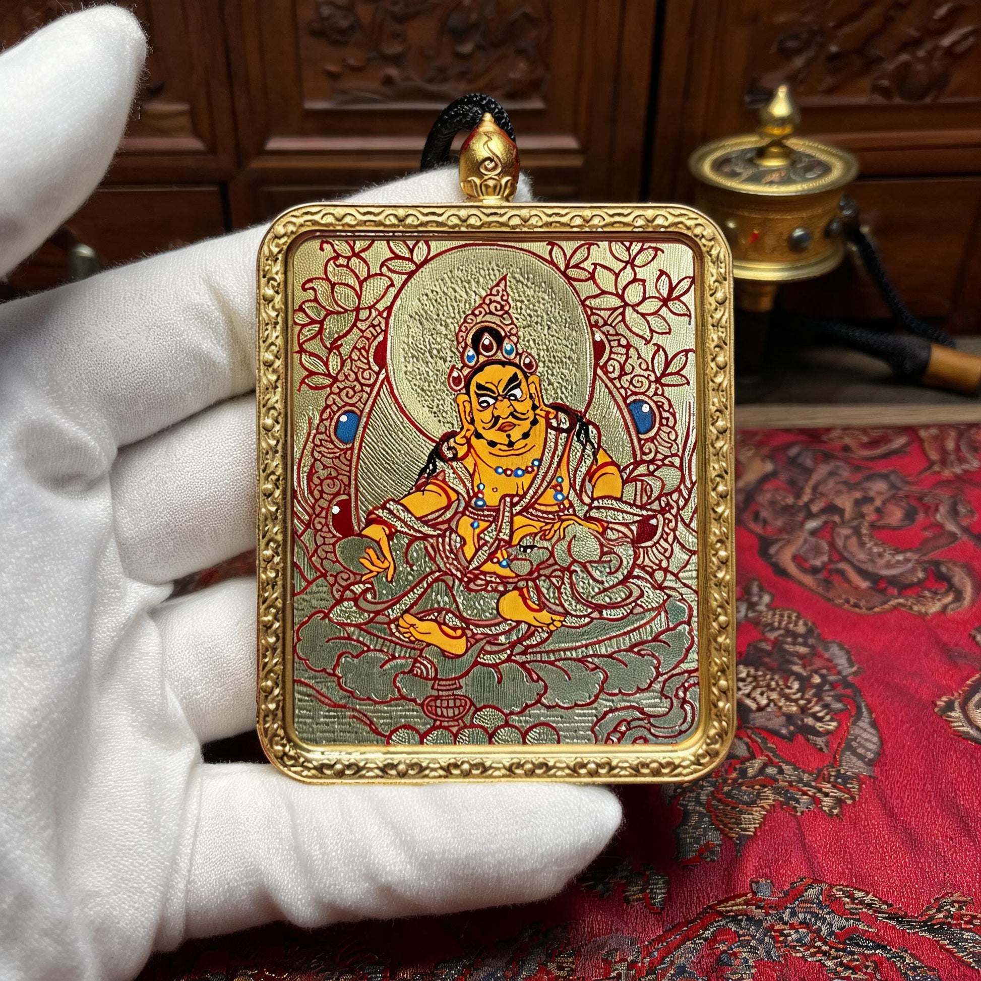 Yellow Jambhala hand-painted Thangka pendant white-glove collector inspection