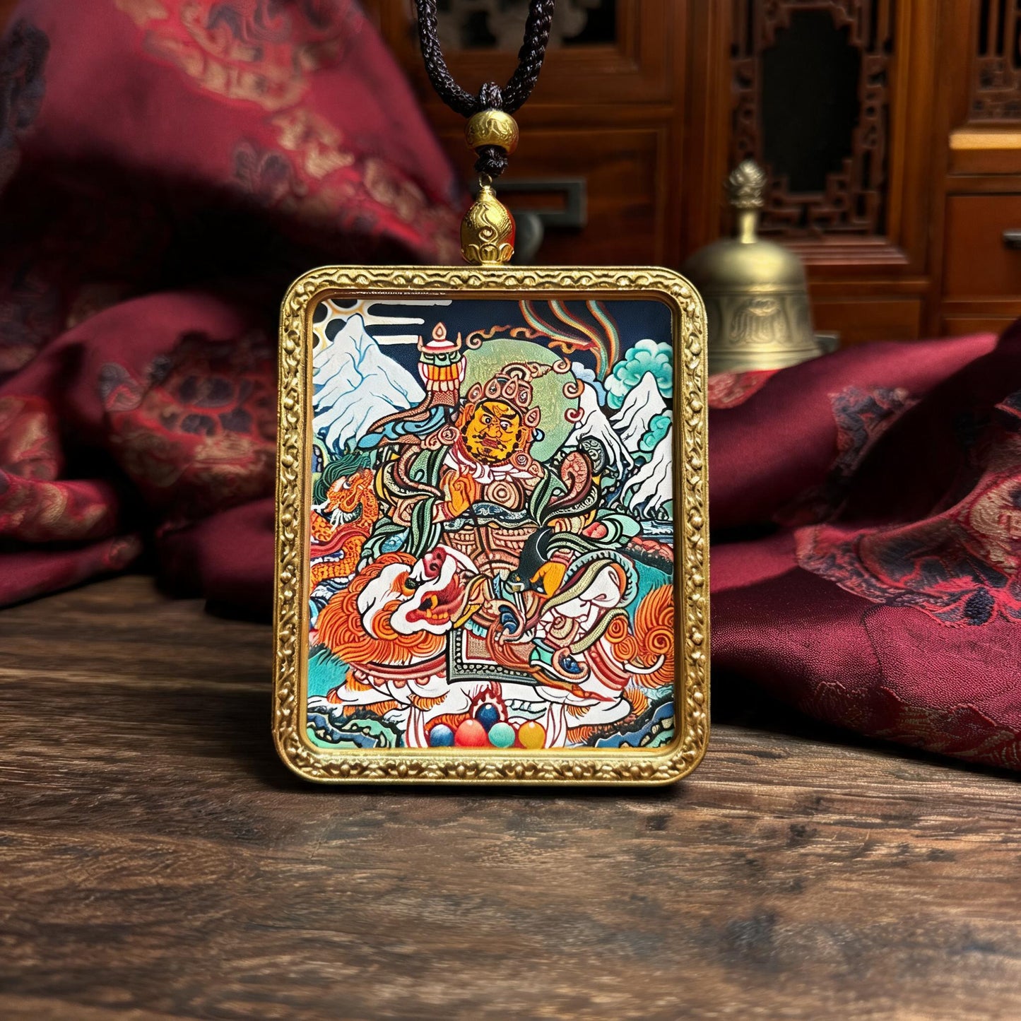 Vaishravana hand-painted Thangka pendant front hero view