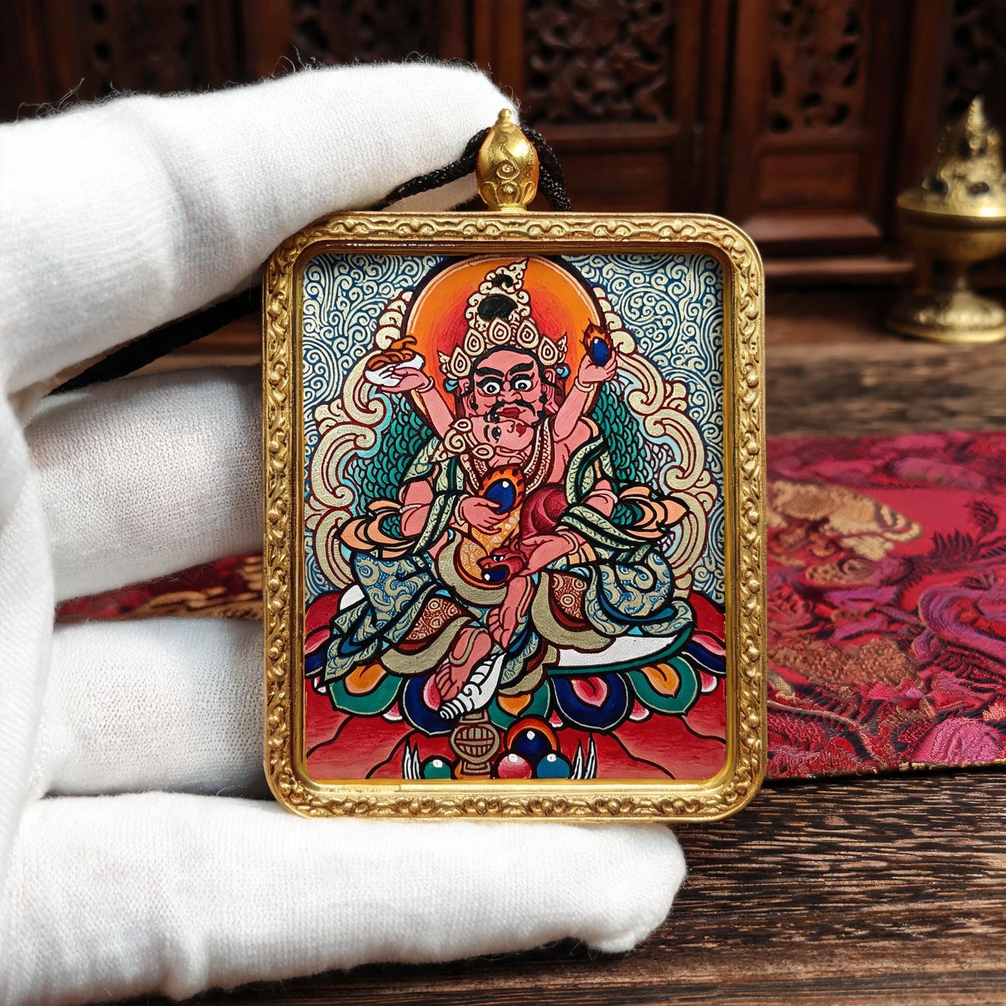 Red Jambhala hand-painted Thangka pendant white-glove collector inspection