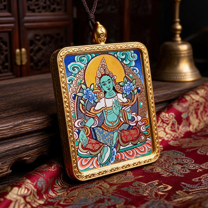Green Tara hand-painted Thangka pendant three-quarter side view