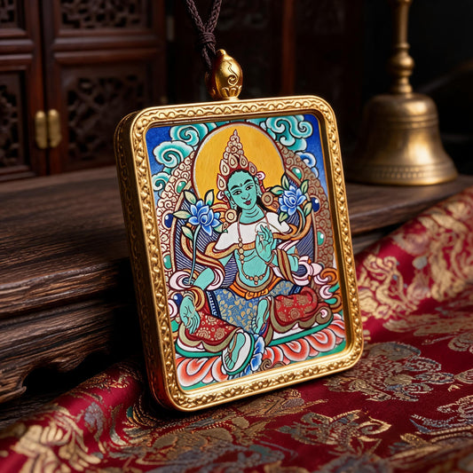 Green Tara hand-painted Thangka pendant three-quarter side view