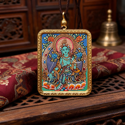 Green Tara hand-painted Thangka pendant three-quarter side view