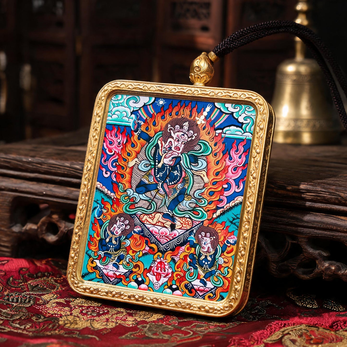 Simhamukha hand-painted Thangka pendant three-quarter side view