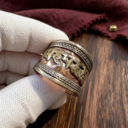 Six-Syllable Mantra Three-Metal Wide Ring white-glove inspection
