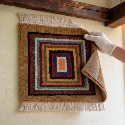 Handwoven Geometric Tibetan Wool Seat Rug white-glove inspection