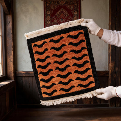 Orange Black Wave Mini Tibetan Rug white-glove inspection