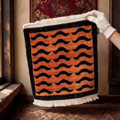 Orange Black Wave Border Mini Tibetan Rug white-glove inspection