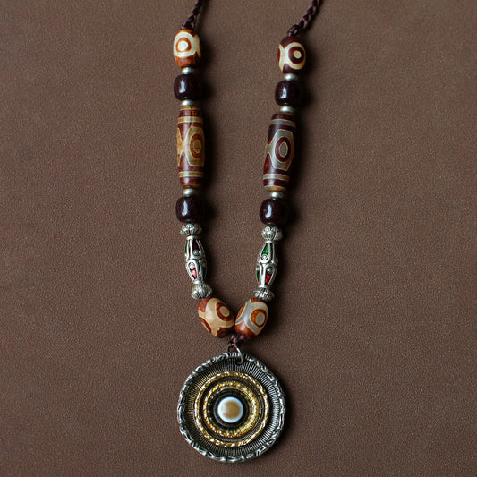 handcrafted Nepalese medicine agate Dzi bead necklace red brown front view