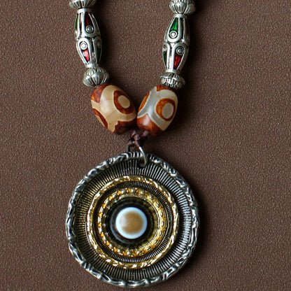 handcrafted Nepalese medicine agate Dzi bead necklace red brown round eye pendant detail