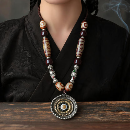 handcrafted Nepalese medicine agate Dzi bead necklace red brown proportional wearing view