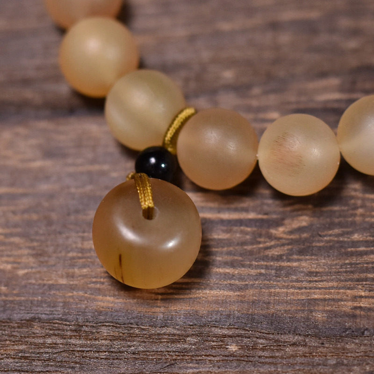 Potala Karma 83 - peace charm - actual product photograph