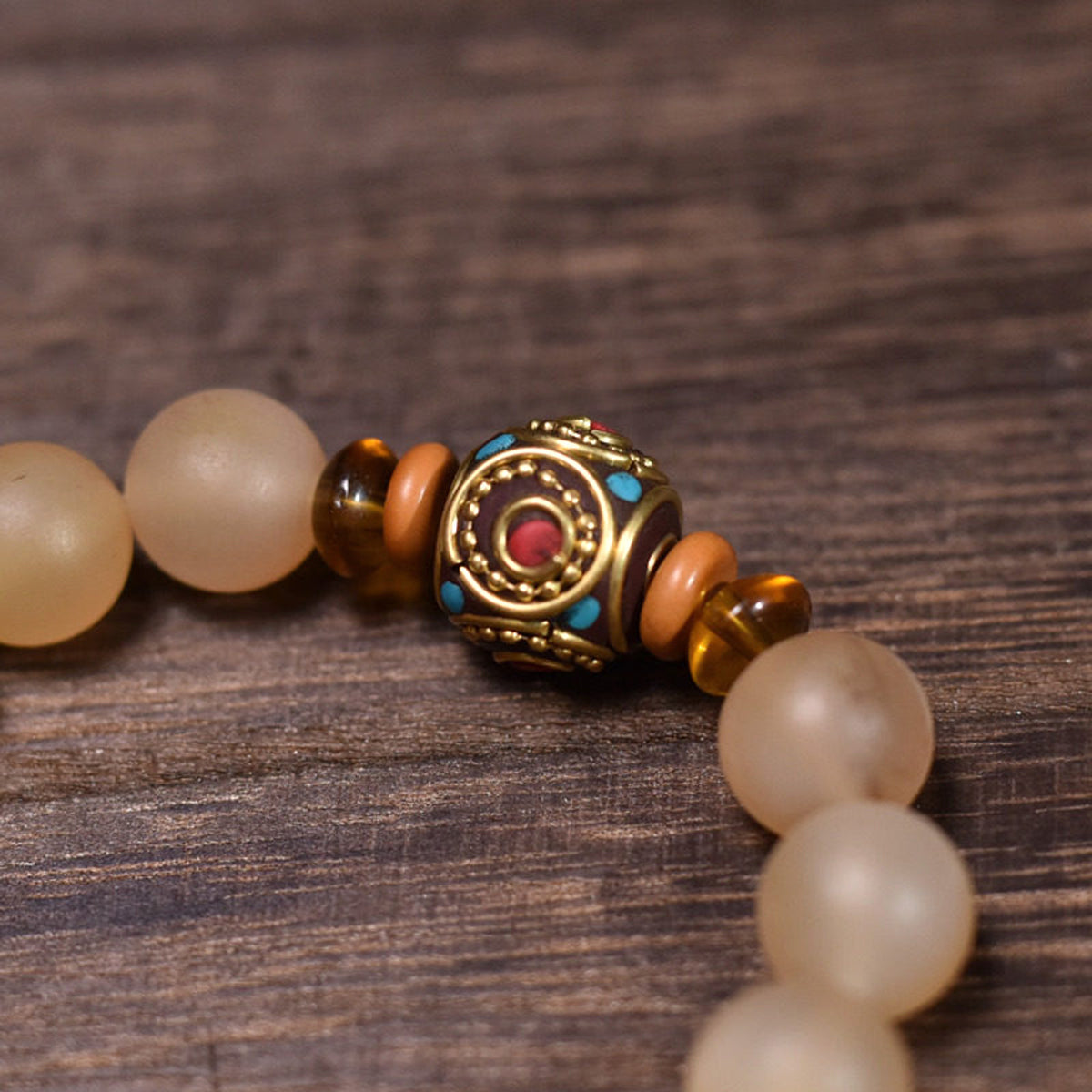 Potala Karma 83 - decorative bead - actual product photograph
