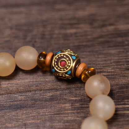 Potala Karma 83 - decorative bead - actual product photograph