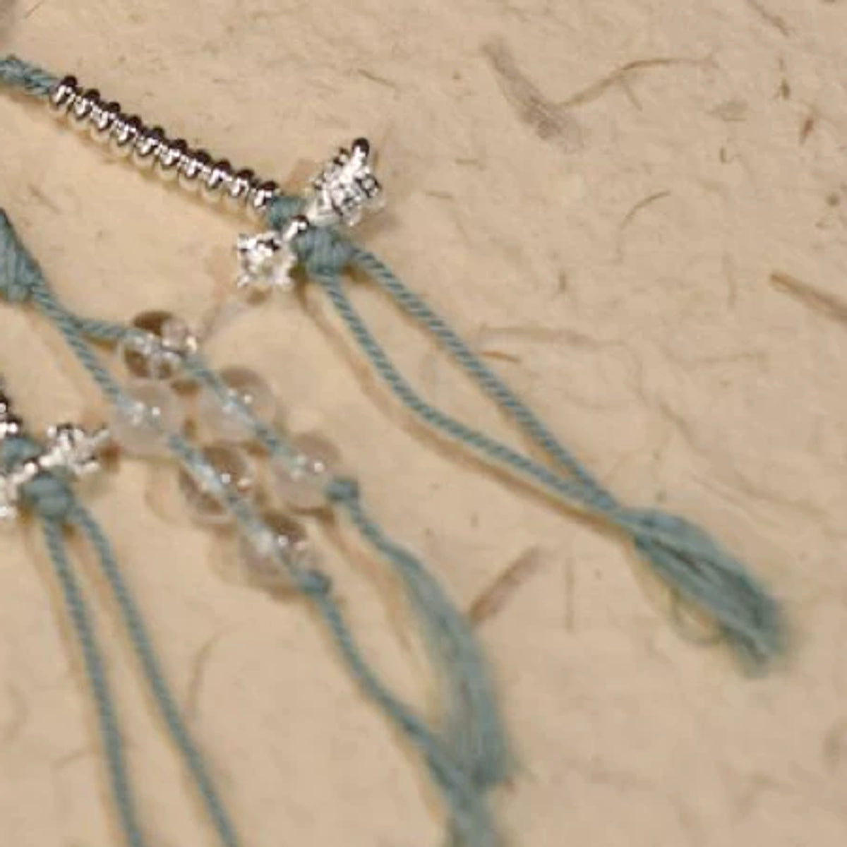 Handcrafted Himalayan Clear Quartz 21-Bead Mala - cordwork detail
