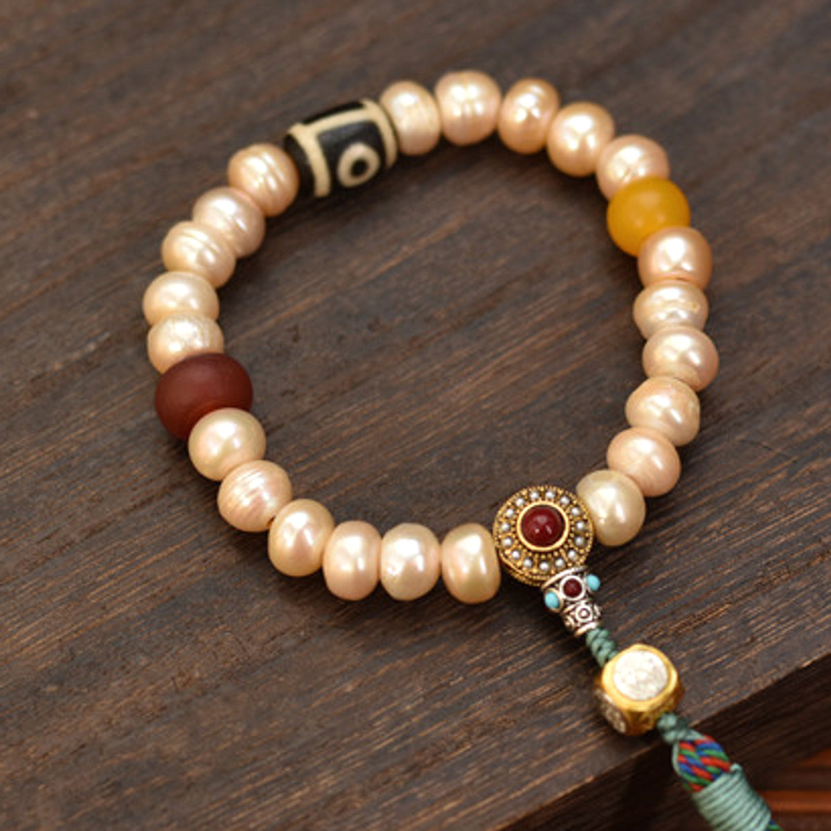 Handcrafted Champagne Pearl Bracelet with Tassel - pearl and patterned bead