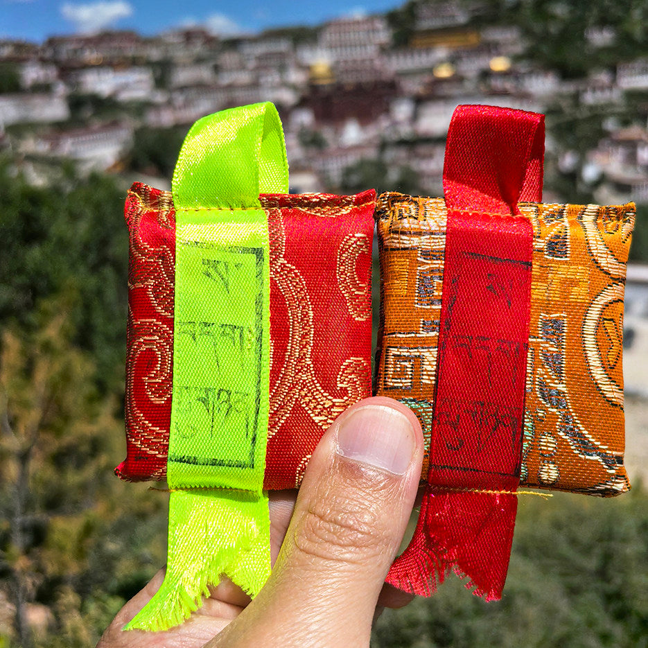 Tibetan brocade amulet - Land and Naga Spirits - actual design reference