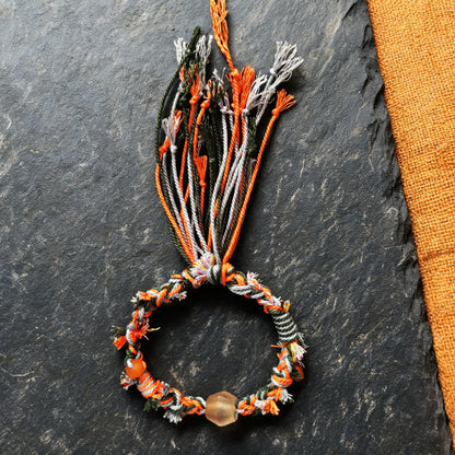 Zhu Xia hand-braided glass bead bracelet braiding detail