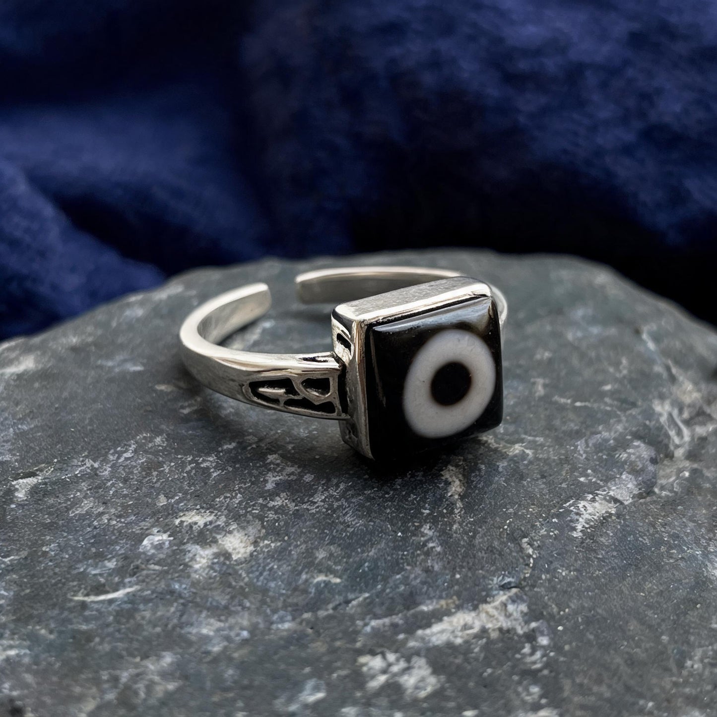Handcrafted one-eyed Dzi S925 adjustable ring style 1 silver setting side view