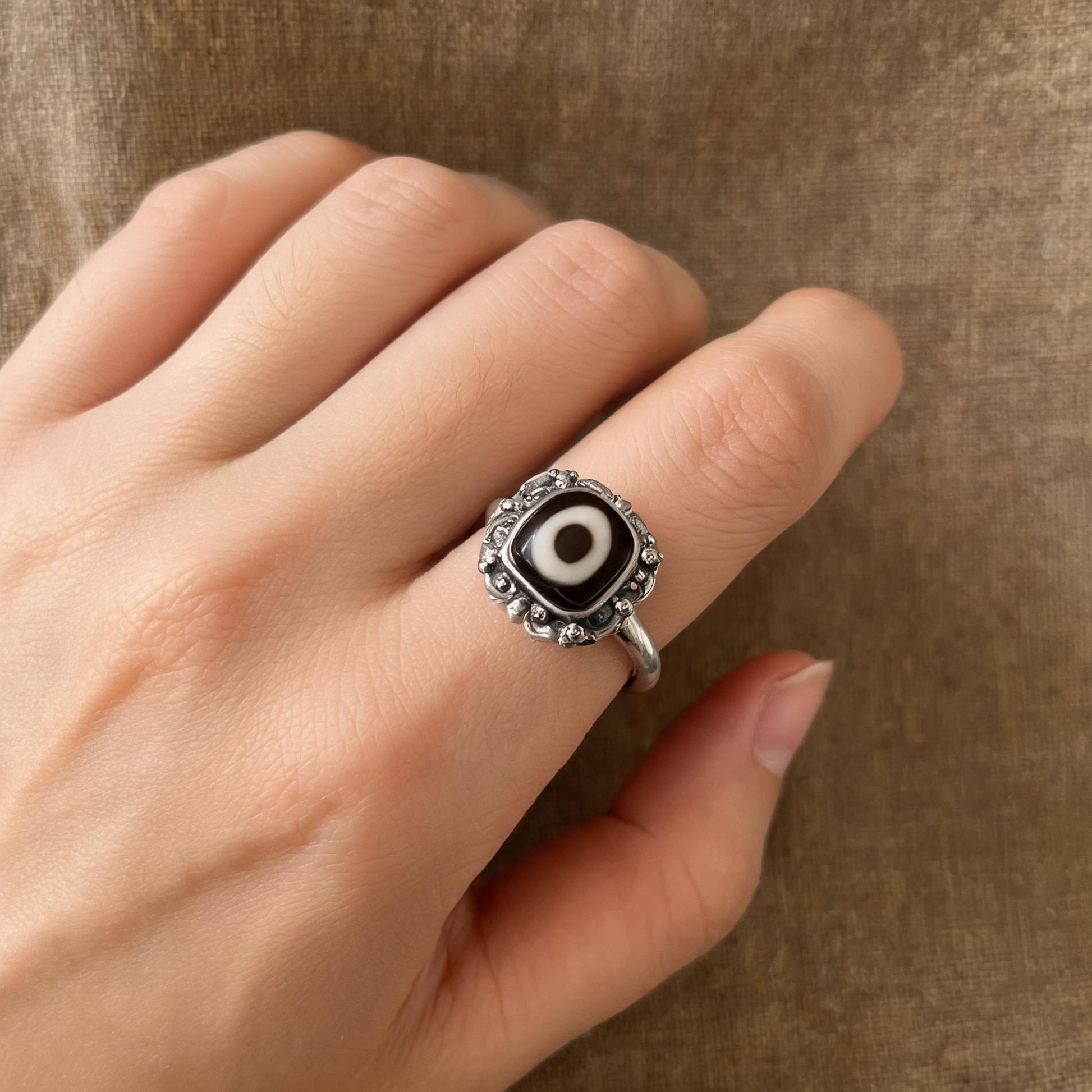 Handcrafted one-eyed Dzi S925 adjustable ring style 2 wearing scale view