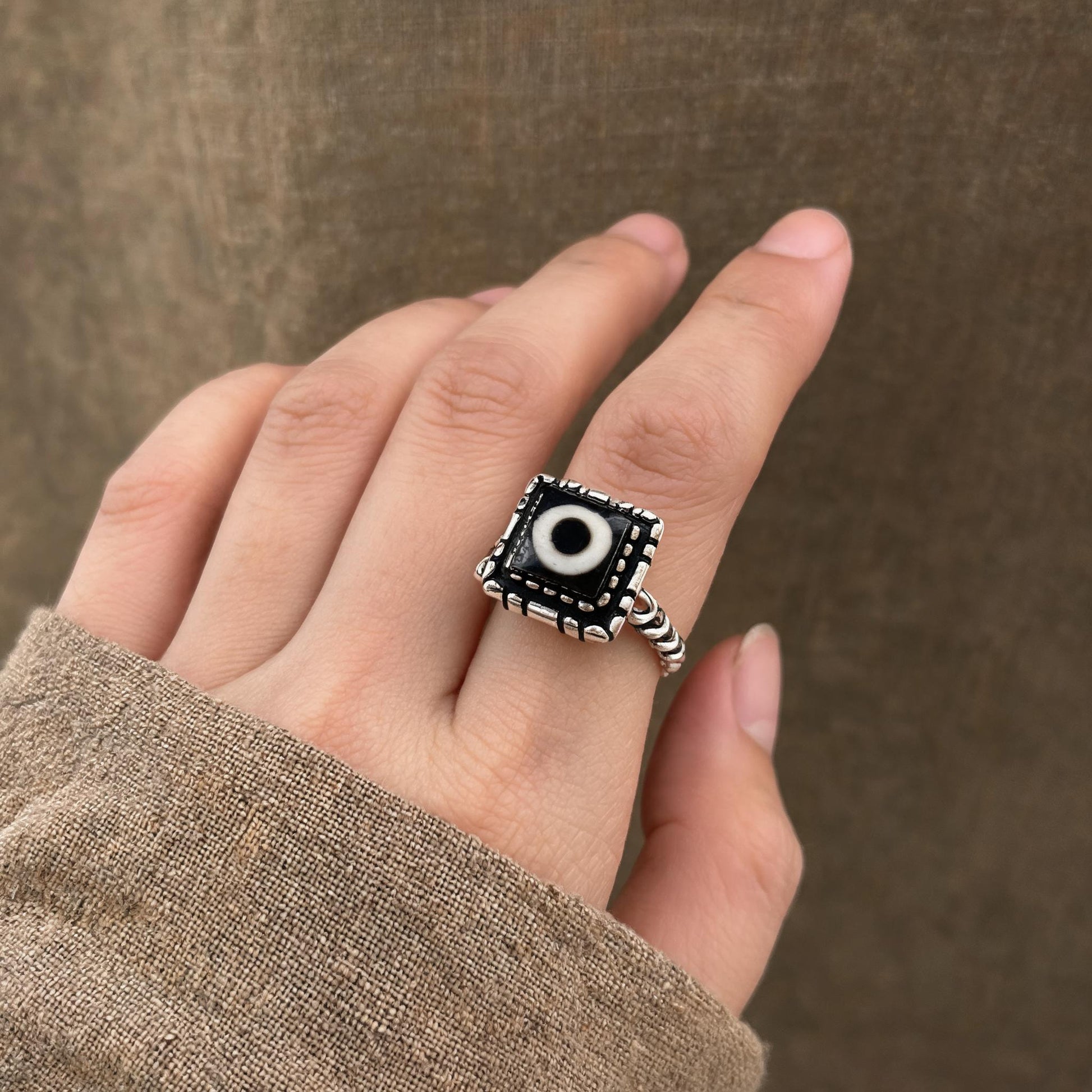 Handcrafted one-eyed Dzi S925 adjustable ring style 3 wearing scale view