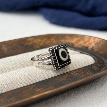 Handcrafted one-eyed Dzi S925 adjustable ring style 6 silver setting side view