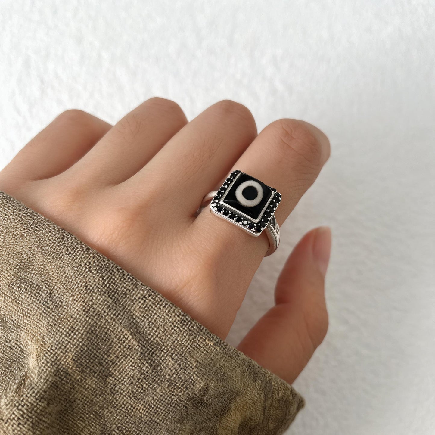 Handcrafted one-eyed Dzi S925 adjustable ring style 6 wearing scale view