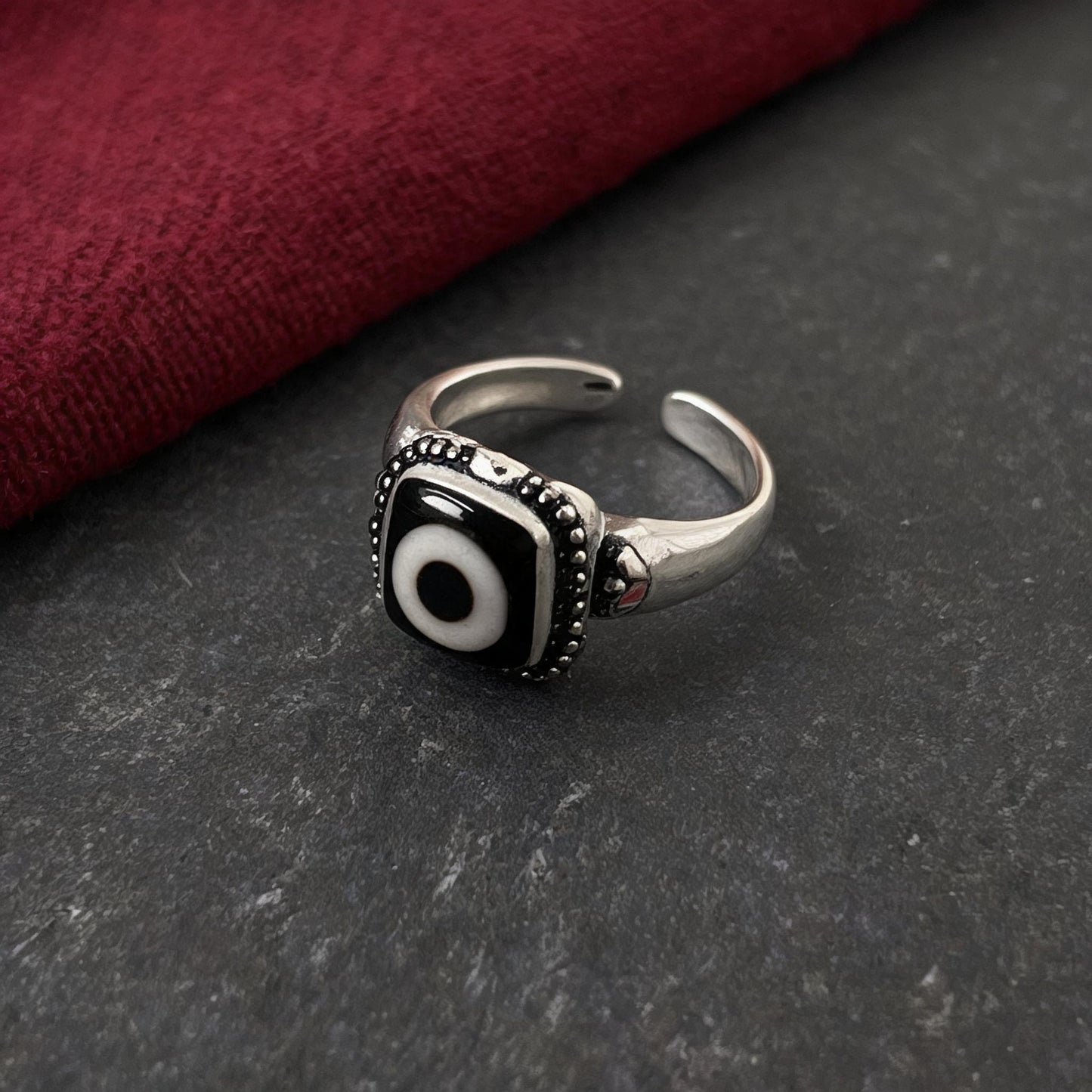Handcrafted one-eyed Dzi S925 adjustable ring style 8 silver setting side view