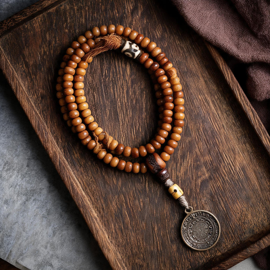 Natural yak bone 108 mala with Nine Palace pendant complete top view