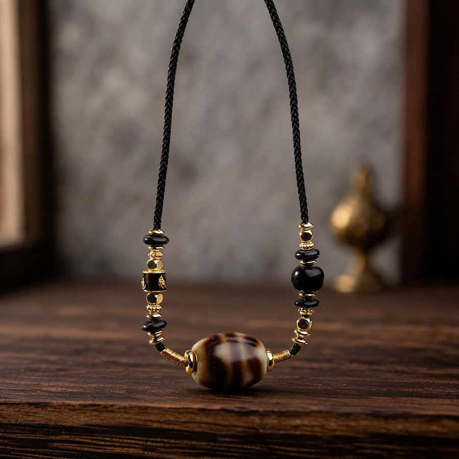 Handcrafted Three-Eye Dzi & Coconut Shell Necklace - front hero