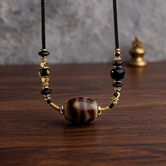 Handcrafted Three-Eye Dzi & Coconut Shell Necklace - three-quarter structure