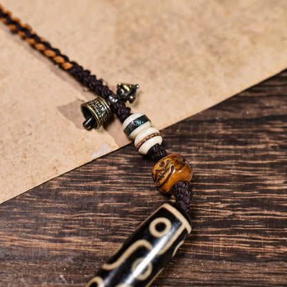 Handcrafted Horizontal Nine-Eye Dzi Necklace - Dzi surface macro