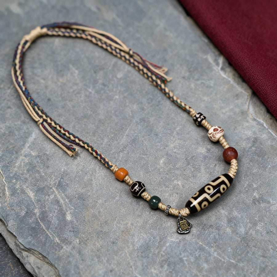 Handcrafted Nine-Eye Dzi Braided Necklace - front hero