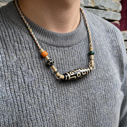 Handcrafted Nine-Eye Dzi Braided Necklace - wearing scale