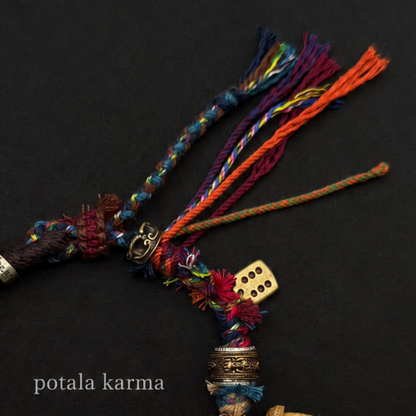 One-of-a-Kind Patchwork Braided Charm Bracelet - adjustable closure and cord detail