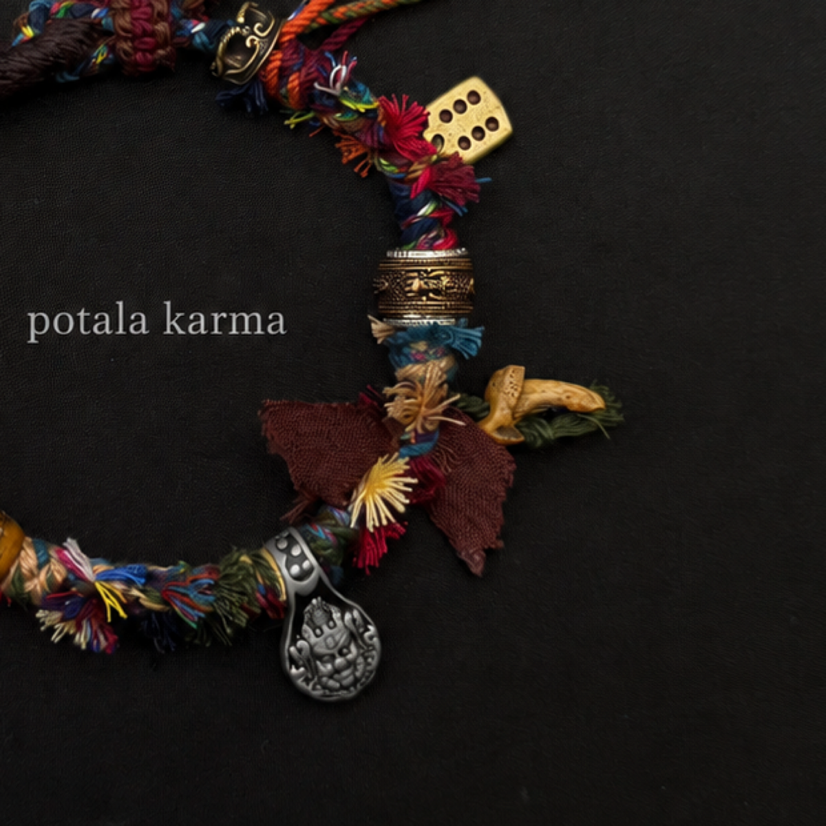 One-of-a-Kind Patchwork Braided Charm Bracelet - decorative charm and bead detail