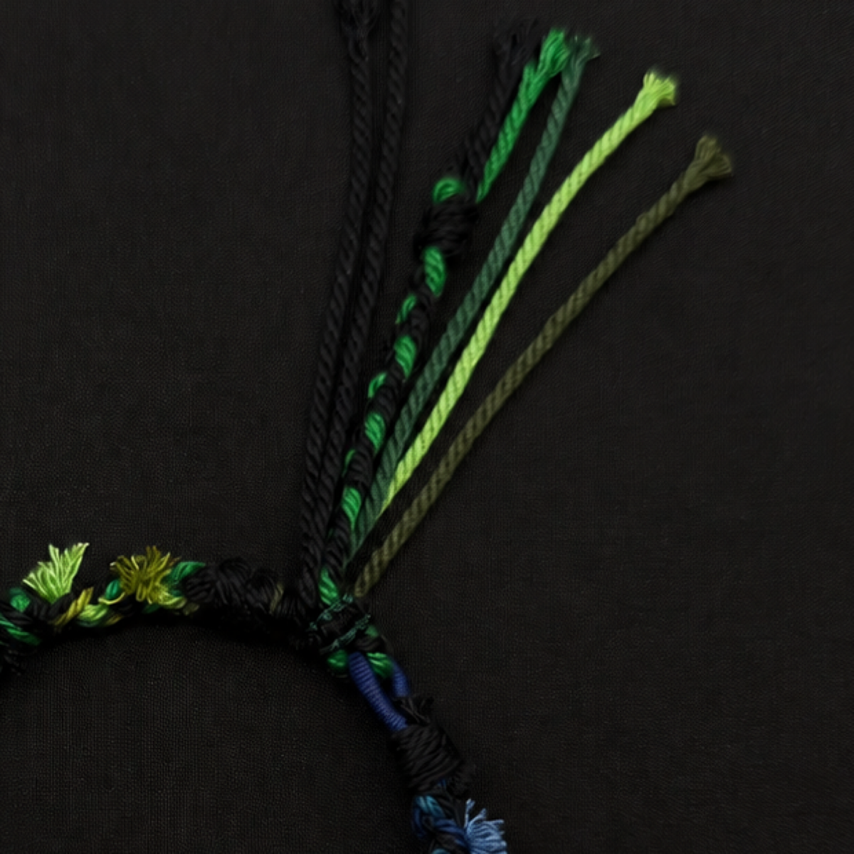 Handcrafted Forest Green Braided Charm Bracelet - adjustable closure and cord detail