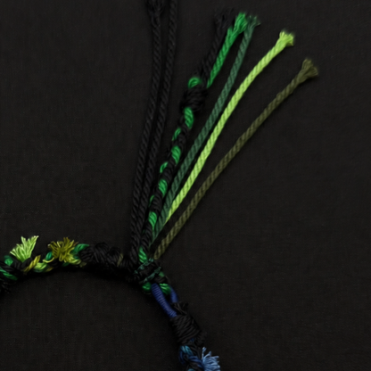 Handcrafted Forest Green Braided Charm Bracelet - adjustable closure and cord detail