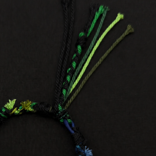 Handcrafted Forest Green Braided Charm Bracelet - adjustable closure and cord detail