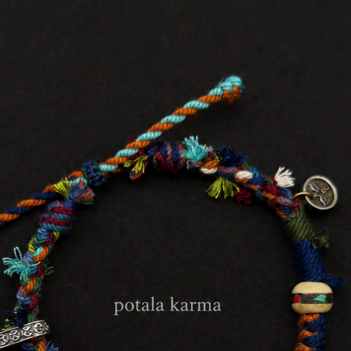Handcrafted Turquoise & Orange Braided Charm Bracelet - adjustable closure and cord detail